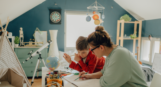 Arizona mom homeschooling her son with ESA funds, using curriculum, a laptop, and art supplies in a sunny home.